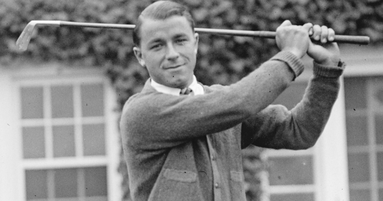 Black and white photo of Gene Sarazen holding a golf club