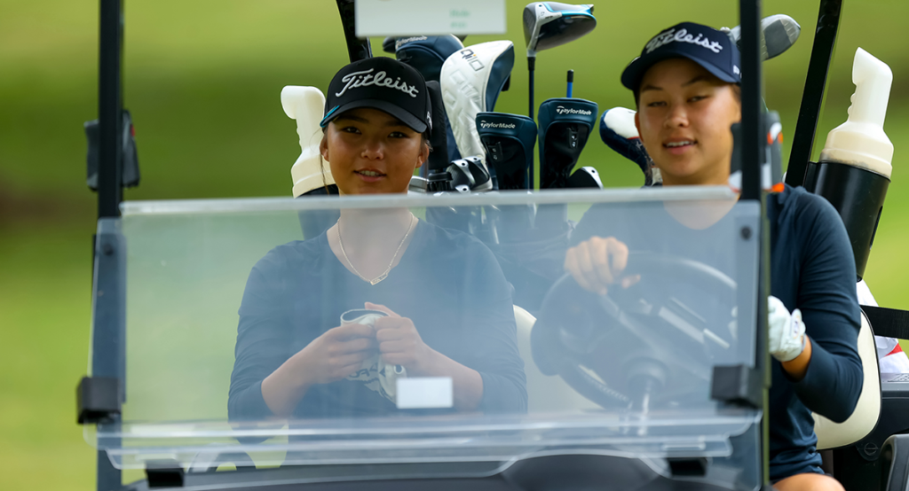 Women members in golf cart playing a round at Mid-Pacific Country Club