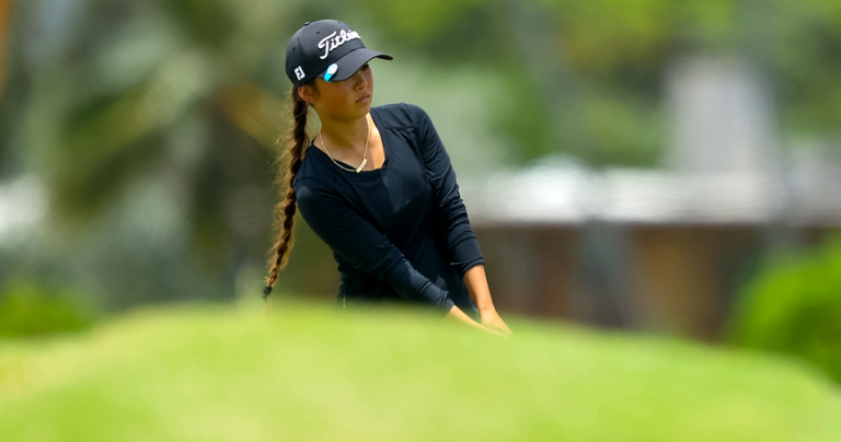 Young woman golfer in tournament play at Mid-Pacific Country Club